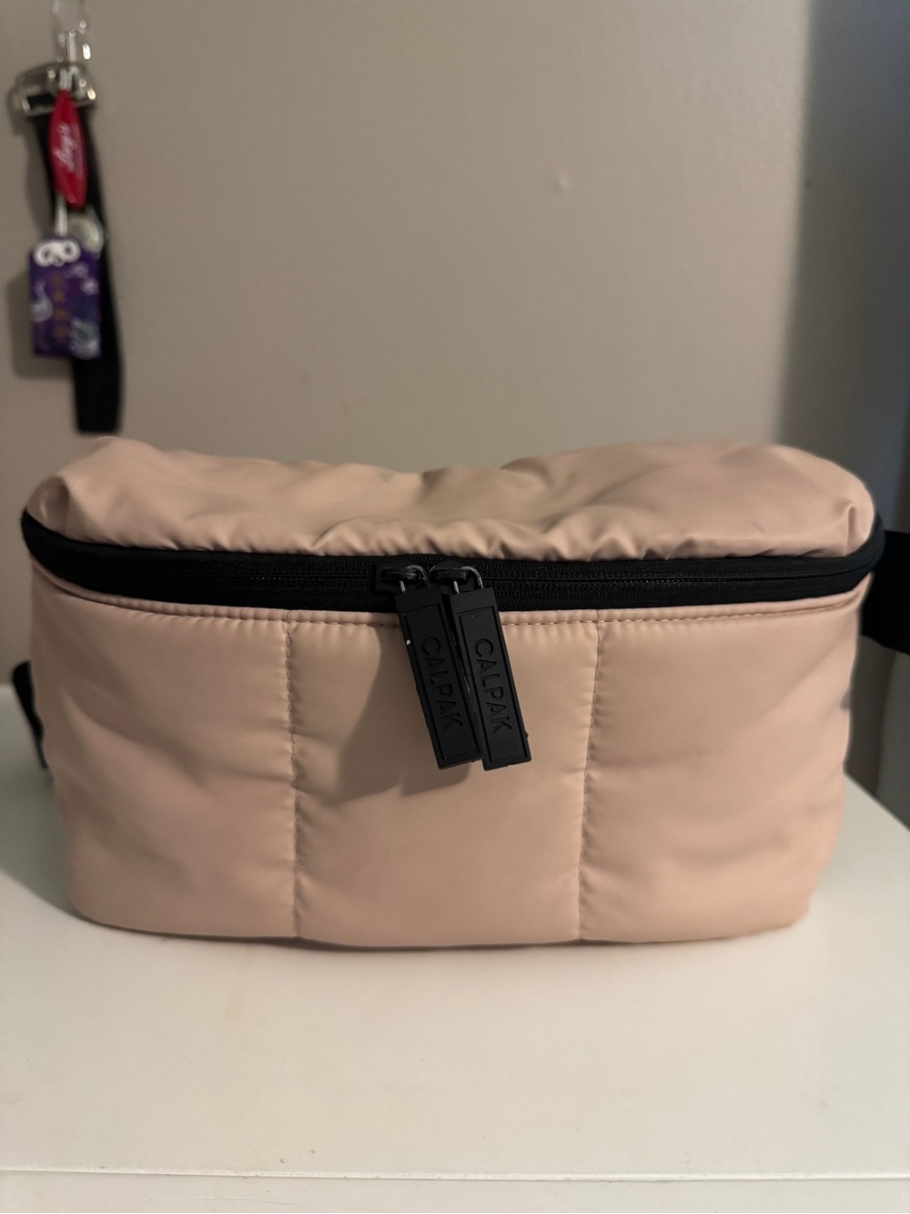Calpak Pale Pink Quilted Belt Bag with Black Zipper